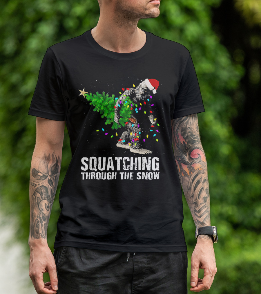 Squatching Through The Snow Bigfoot Christmas Lights Santa Hat T-Shirt
