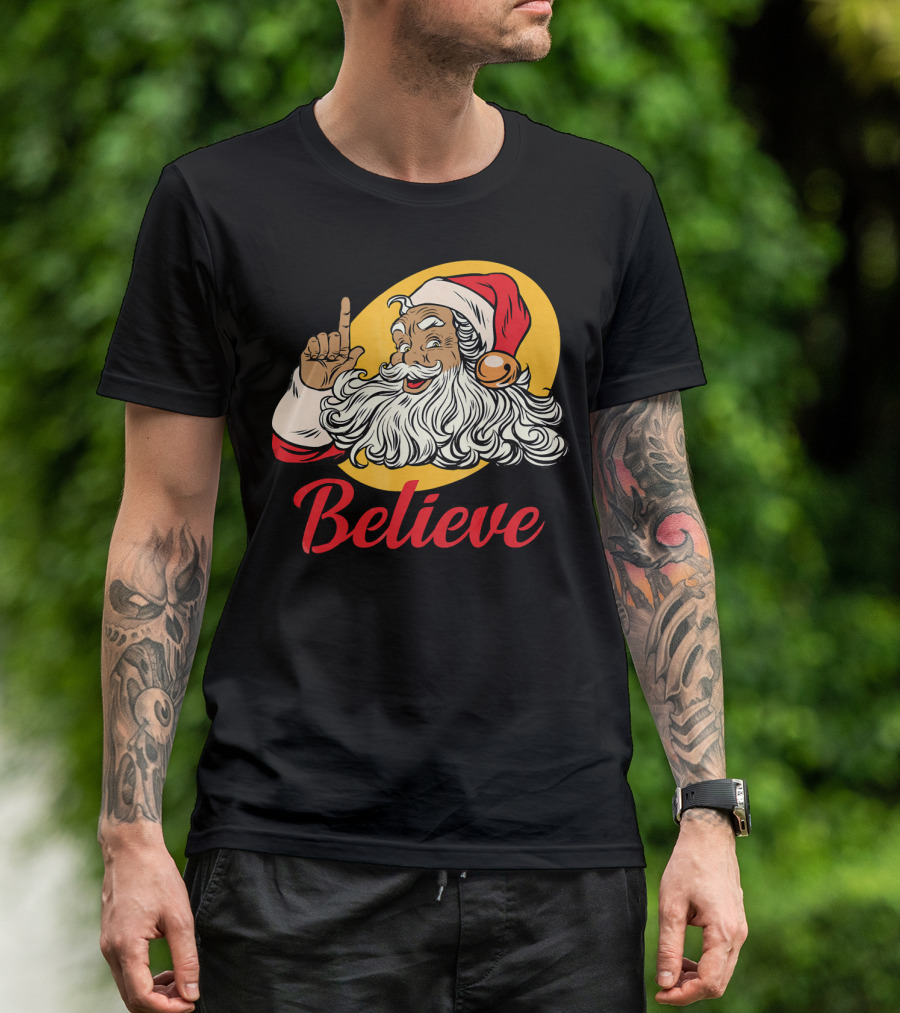 Black Santa Claus With Believe Caption And Yellow Background T-Shirt