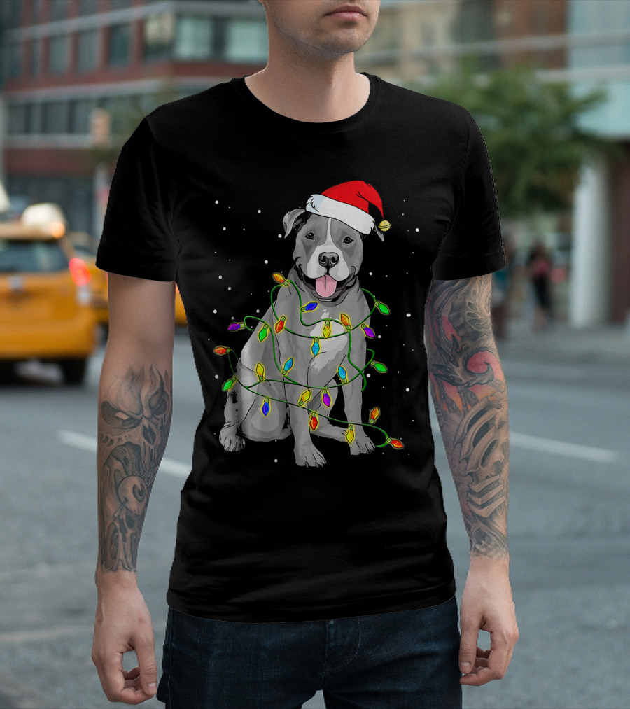 Pitbull In Santa Hat Wrapped In Christmas Lights With Snowy Background T-Shirt