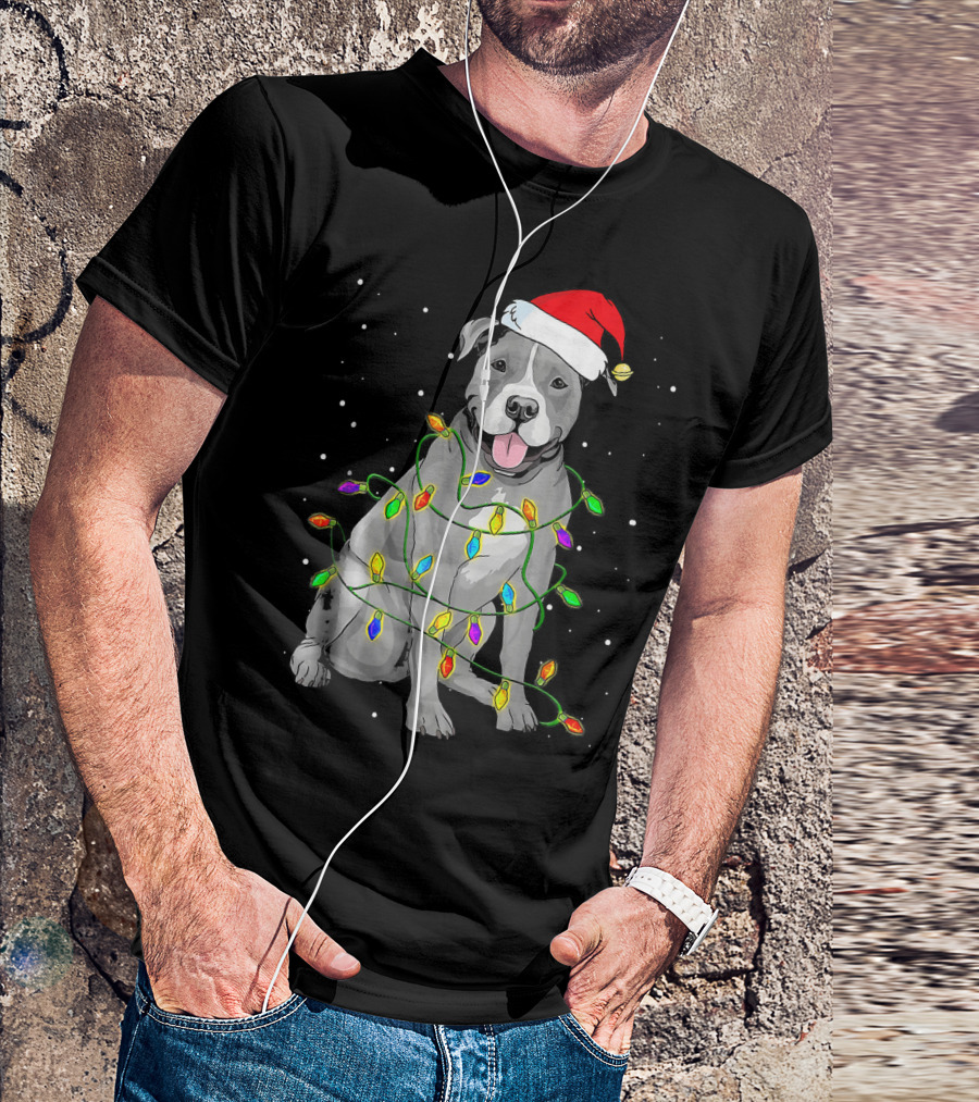 Pitbull In Santa Hat Wrapped In Christmas Lights With Snowy Background T-Shirt