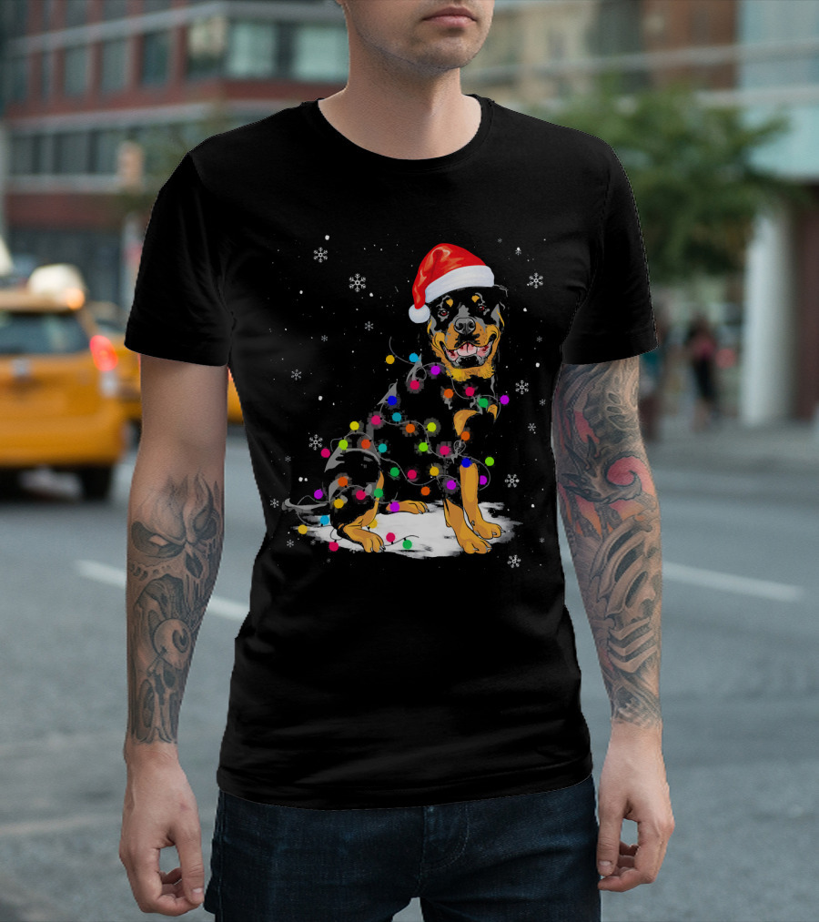 Rottweiler With Santa Hat And Colorful Christmas Lights In Snowy Scene T-Shirt
