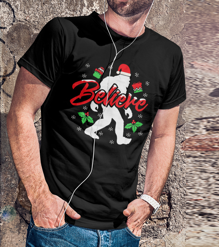 Believe Bigfoot Christmas Santa Hat Snowflakes Holly T-Shirt