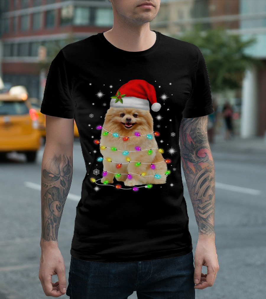 Pomeranian Pup Wrapped in Christmas Lights with Santa Hat and Festive Glow T-Shirt